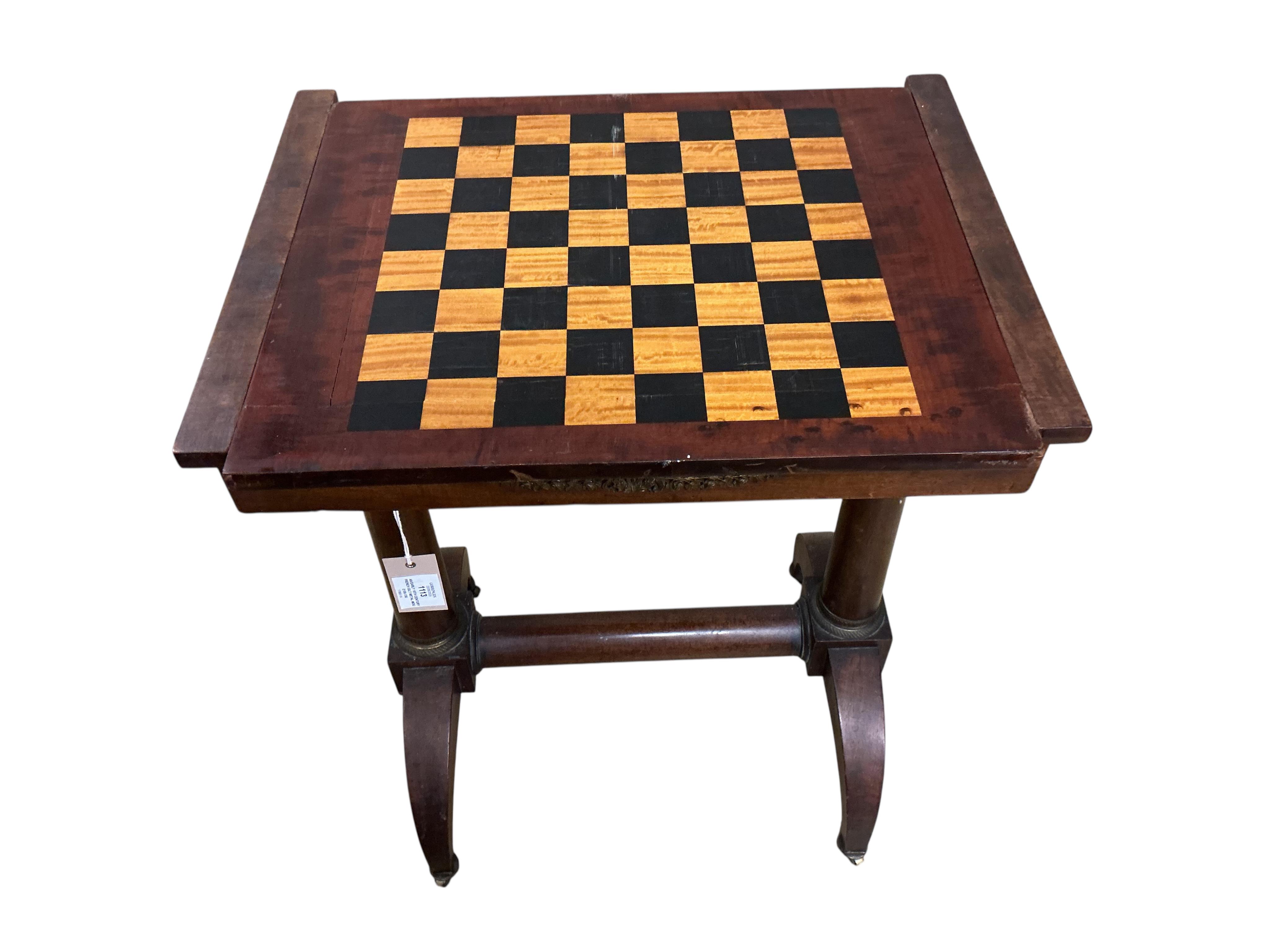 An early 19th century French gilt metal mounted mahogany games table, width 54cm, depth 41cm, height 70cm